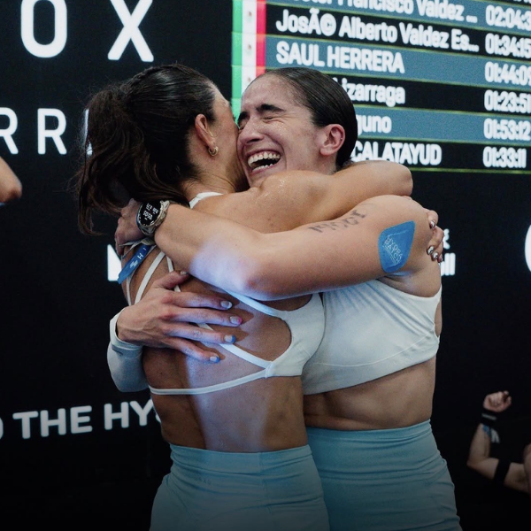 Two women wearing HydraPatch® Hugging