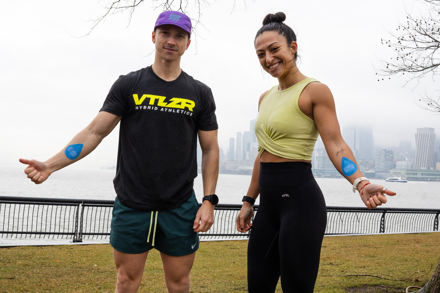 Man and Woman Giving Thumbsa up wearing HydraPatch® 